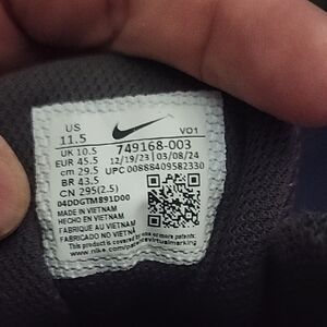Nike White and Black Shoe Size Label Close-Up